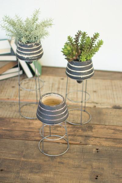 Set Of 3 Black And White Clay Vessels On Wire Stands