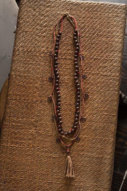 Black Bead with Red String and Jute Tassle Necklace